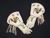 Pair of gauntlets with beadwork cowboys on horses