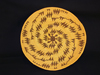 A Maidu tray with a lightning design