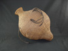 A Paiute seed jar with horse hair handles