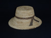 A Papago ladies hat with a black woven ribbon design