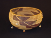 A Pomo bowl with clam shell discs