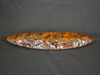 A brown/black obsidian blade