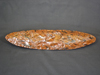 A brown/black obsidian blade