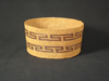 A Tlingit basket with horizontal bands