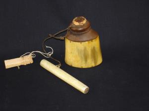 An Eskimo horn and wood snuff container