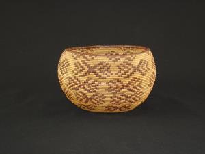 A Maidu basket decorated with butterflies