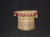 A Paiute basket with beadwork on rim