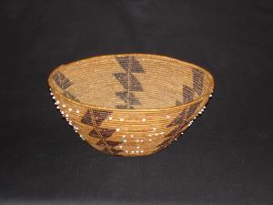 An early Pomo bowl with beads