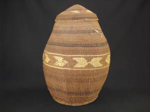 A very large and nice Siletz basket with decorated cover