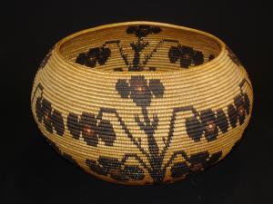 Washoe Basket with flowers by Tootsie Dicksam