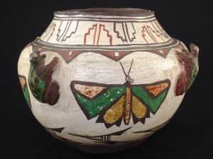 A wonderful Zuni polychrome frog and butterfly pottery jar