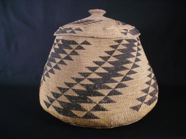 A large fancy Hupa basket with lid