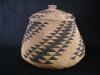 A large fancy Hupa basket with lid