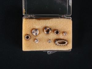 A collection of eight miniature baskets